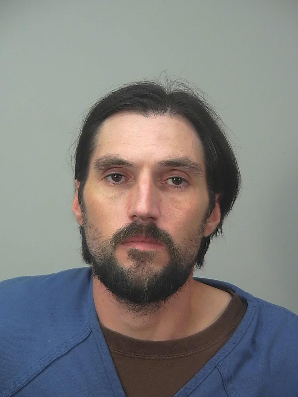 Man who was shot by police pleads guilty to making threats